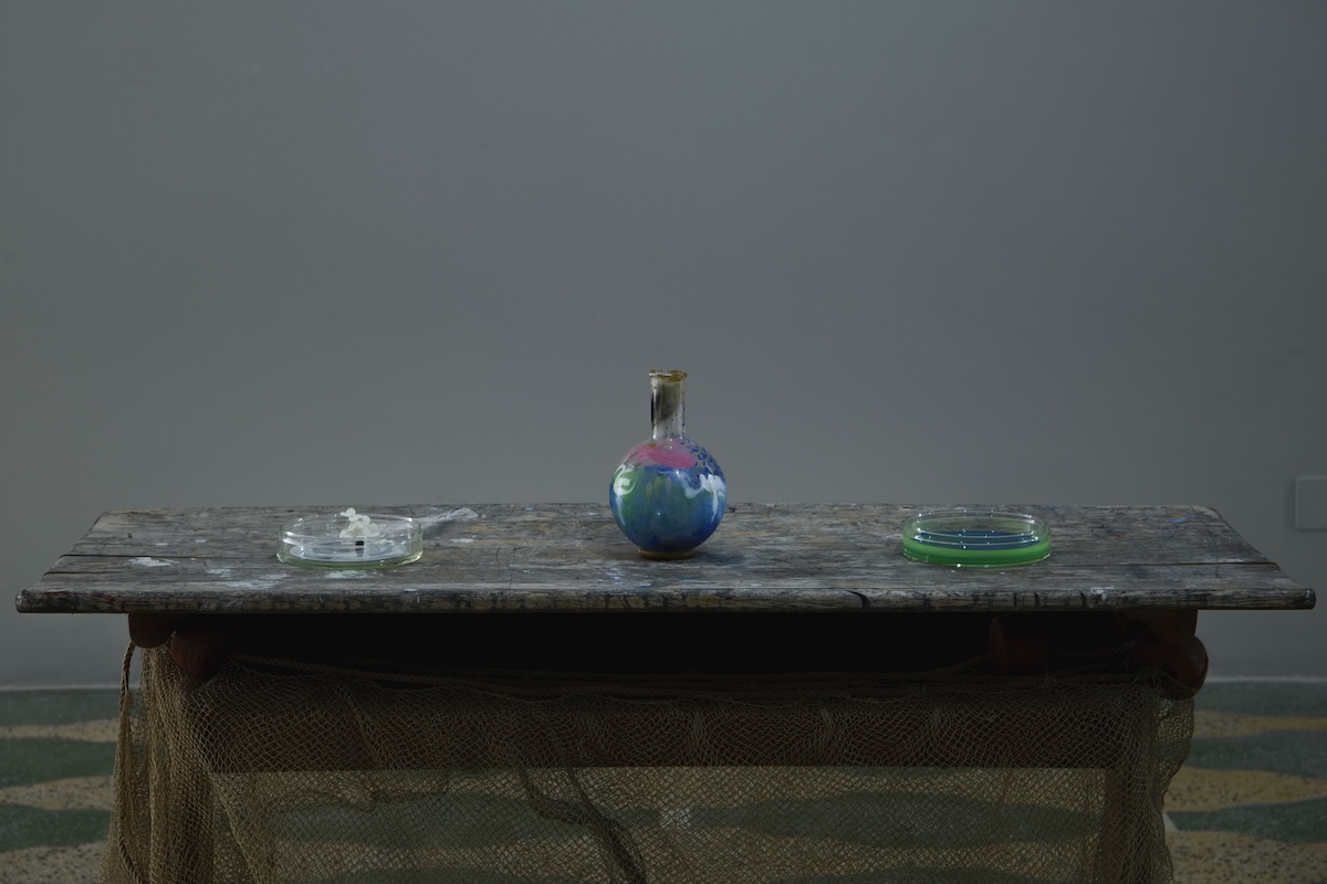 Genc Kadriu, Wavelike, 2025. Wood, paper, fiber, pigment, glass, wax, water, flower. Ph: Zeni Alia