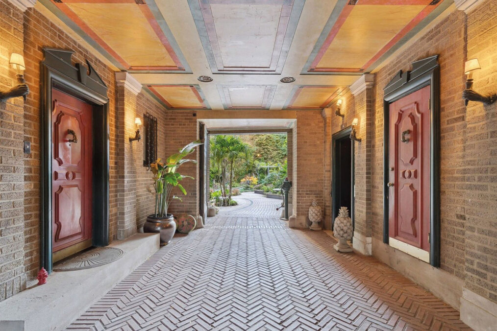 The main corridor leading to gallery spaces within the historic apartment. Courtesy of Neighbors Art Fair