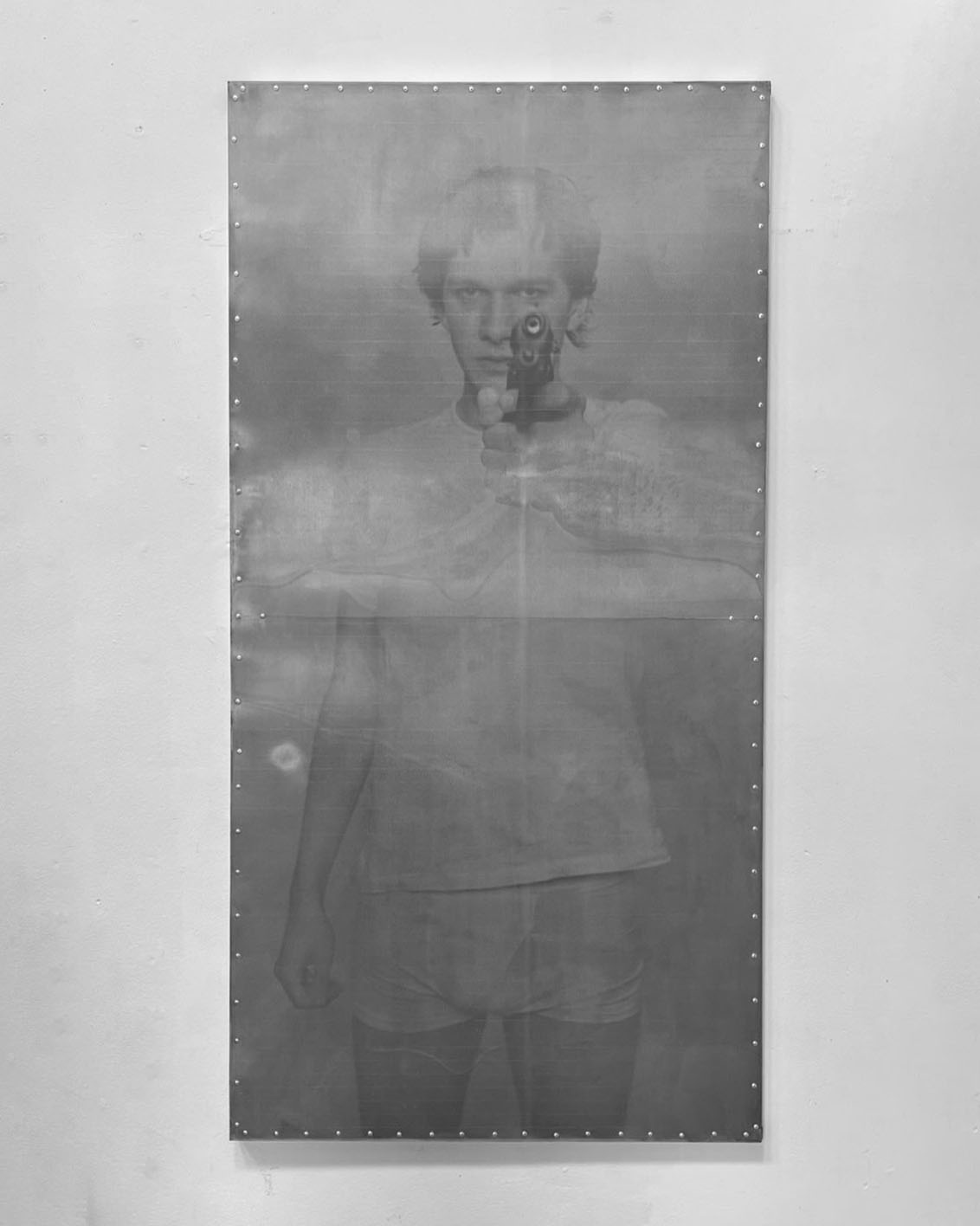 Lonesome Town Acid, 2025. Acid etching on stainless steel, 100 × 200 cm. Courtesy of the artist.