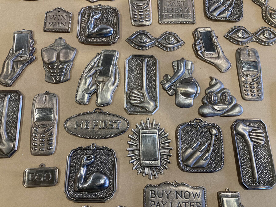 Bronze cast objects/ex-votos as part of L’Opium du Peuple (2026) on Odermatt’s desk. Photo by Corinne Odermatt