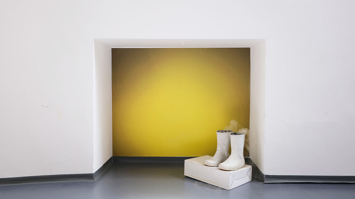 Elisabeth Molin, translucent skin, neoprene suits (2021) wallpaper, rubber boots, humidifiers, ventilators, cardboard box, dimensions variable