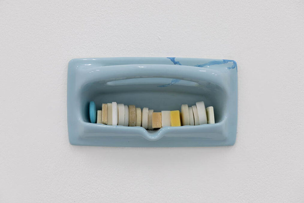 Nancy Lupo, The Repository (detail) (2026). 22 ceramic soap dishes and soaps. Installation view, Several Chickens Later, Spike Island, Bristol. Photograph by Rob Harris.
