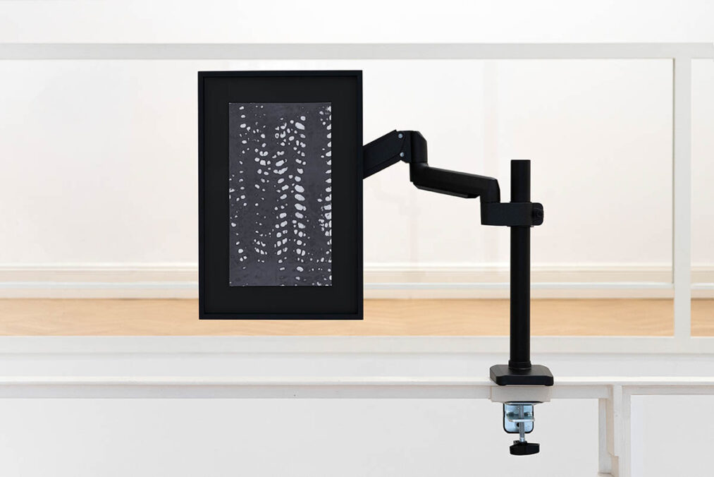 Velum – Solve the limit: Σ → ∫, 2025. Offset printing on thermal paper, heat printing, monitor support. Variable dimensions, in photo: 50x78x20 cm. © Camilla Gurgone