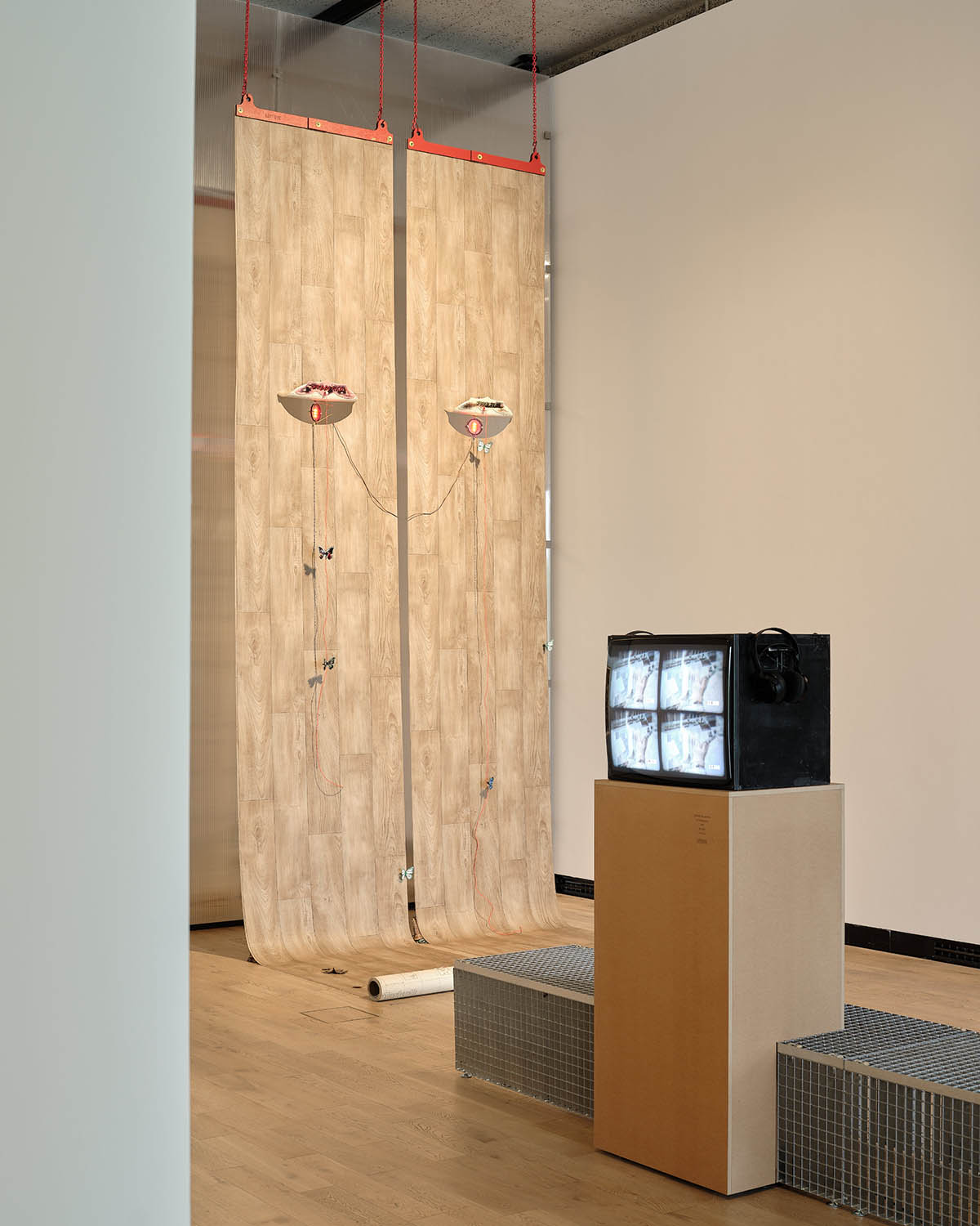 Exhibition view, Memory of Touch: Chapter I (The Kunsthalle Praha Collection in Dialogue), Jakub Choma, Inflamed Eyes, 2025 (left) and Zbyněk Baladrán, Act of Repeating, 2005 (right). Photo: Vojtěch Veškrna.