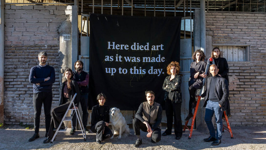 Portrait of Numero Cromatico in front of their project space in via dei Volsci 165 - Rome, photographed by Serena Eller Vainicher, 2022