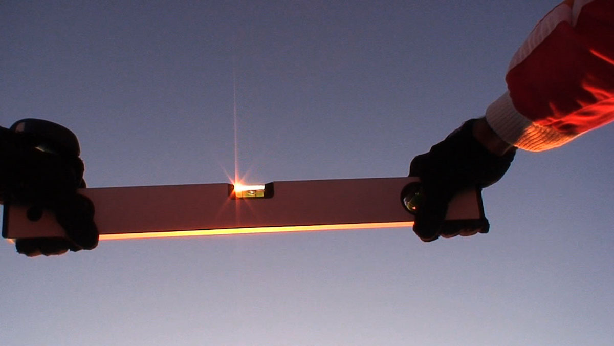 João Onofre, Untitled (leveling a spirit level in free fall feat. Dorit Chrysler's BBGV dub), 2009, Video still.